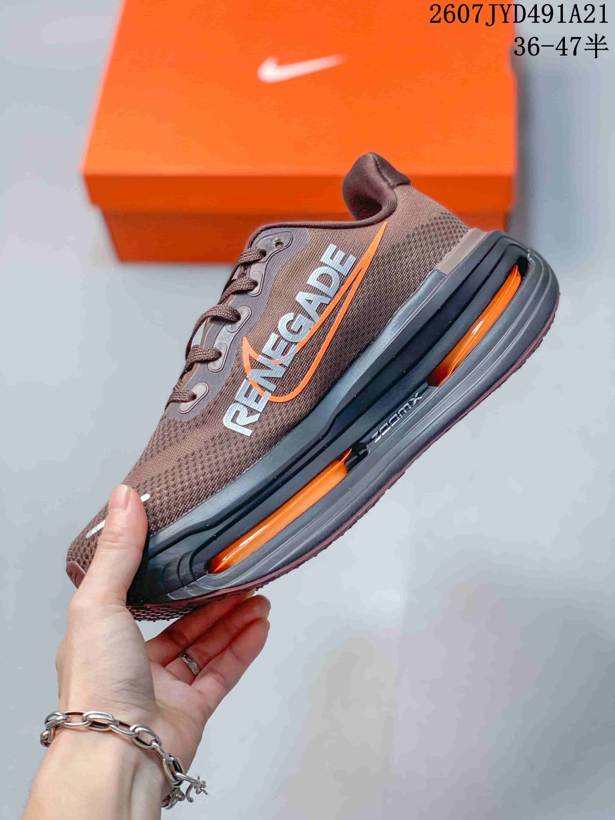 Side profile of the brown sneaker showing Pegasus branding, orange accents, and a sculpted black-and-orange midsole.