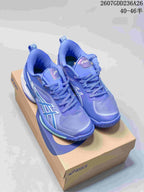 Blue ASICS Swiftace basketball shoes displayed on an ASICS shoebox, showing the lace-up construction and contrasting side details.