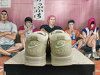 Rear view of beige Nike sneakers showing Nike Air heel branding.