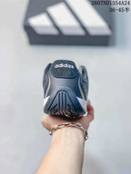Rear view showing the heel structure, outsole pattern and adidas branding.