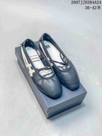 Pair of dark navy Onitsuka Tiger GYMNARINA Mary Jane shoes displayed on a shoebox, with white side stripes and the listed size range visible above.
