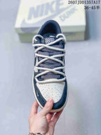 Top-down view of the sneaker showing the perforated white toe box and multiple rope-lace crossings.