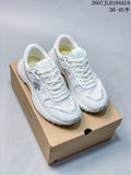Pair of white Descente Chron low-top sneakers displayed on a branded shoebox; image overlay shows style code 2607JLD184A24 and size range 36–45.