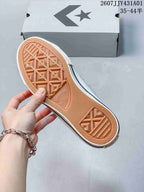Close-up of the gum-colored patterned outsole