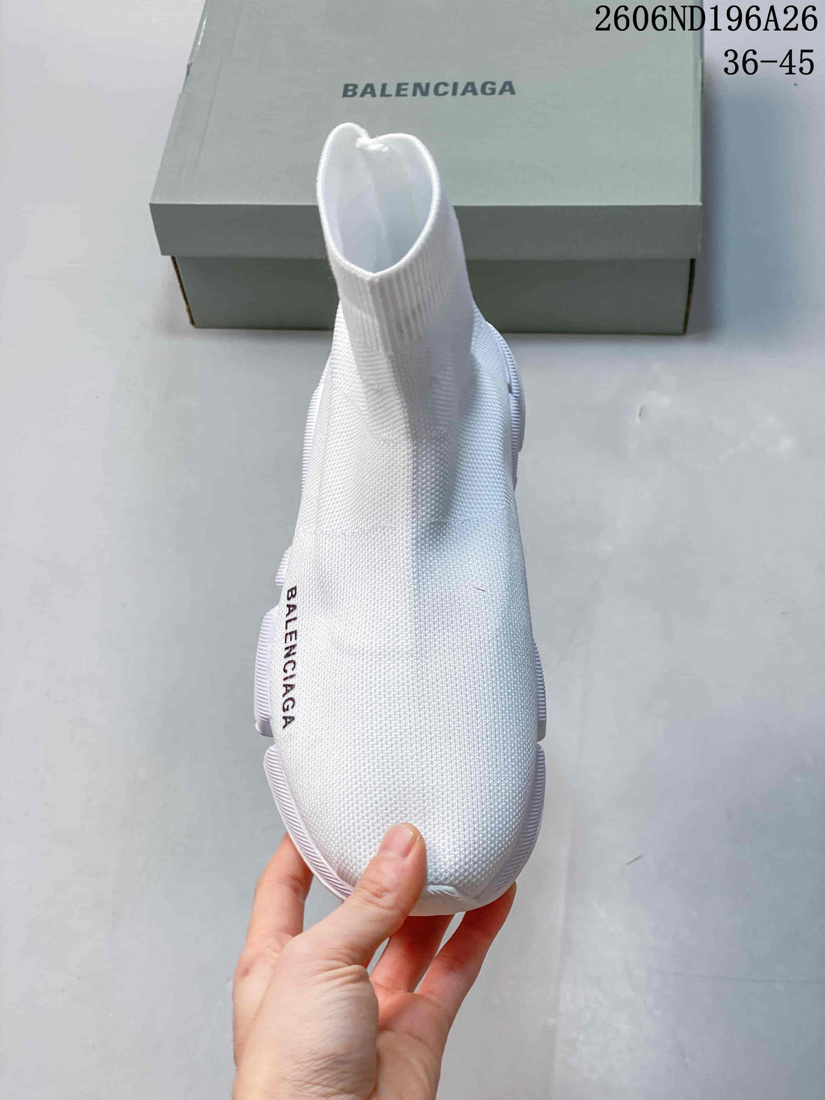 Top view of a white sock sneaker showing the rounded toe, knit construction and side Balenciaga branding.