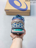 Rear view of the sneaker showing the padded heel, layered upper and textured outsole.