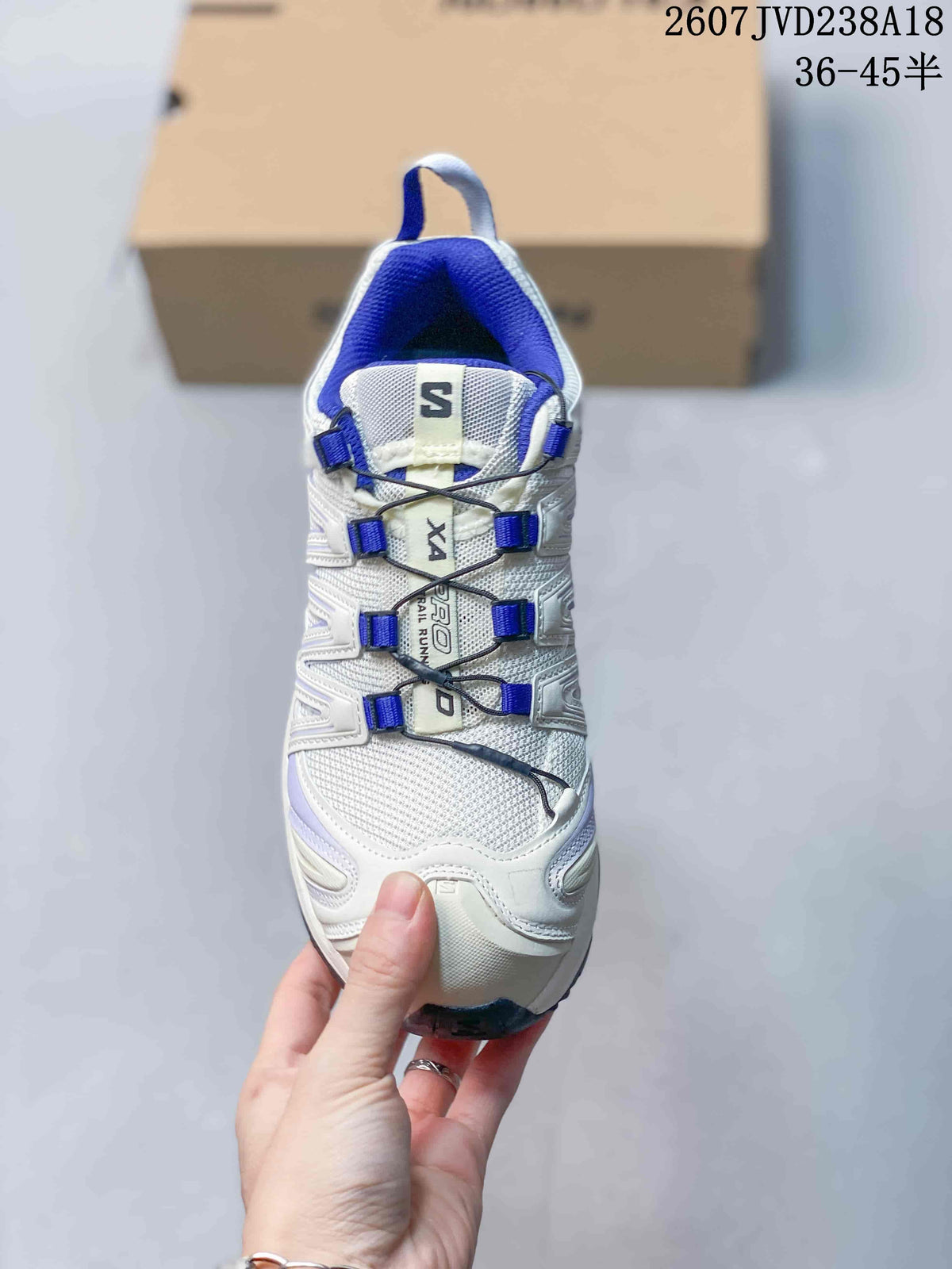 Top view of the Salomon XA Pro 3D V9 shoe showing the blue cord lacing system and mesh-style upper.