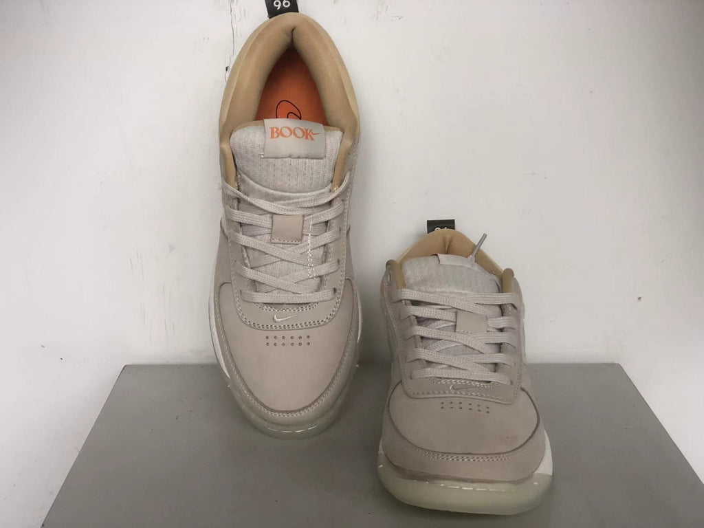 Top view of the Nike Book 1 shoes showing the laces, toe perforations, and tongue branding.