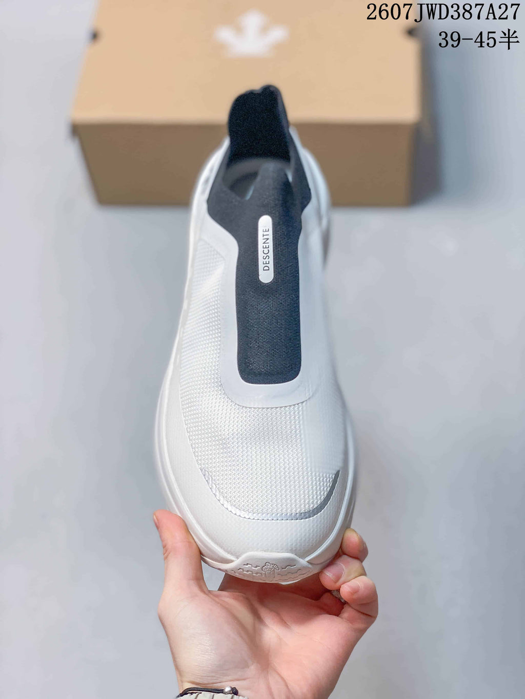 Top view showing the white toe area and navy central slip-on panel.