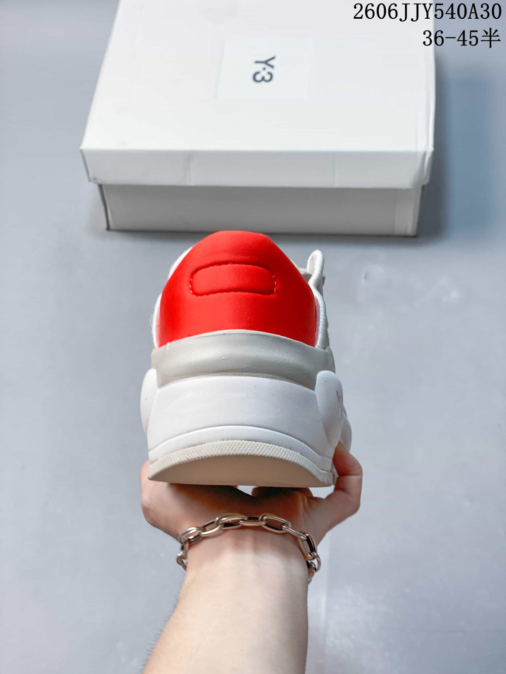 Rear view showing the red padded collar and sculpted heel