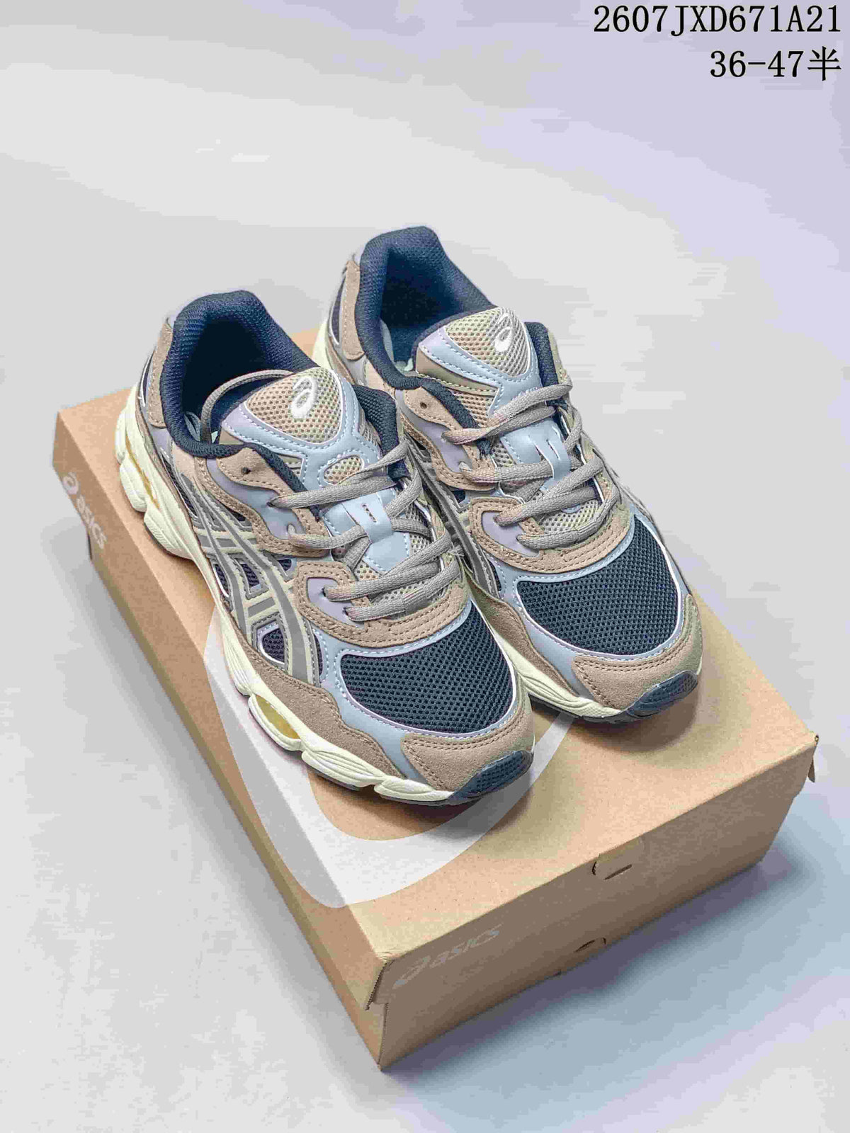 Pair of Asics GEL-Kayano 14 sneakers in grey, beige, and navy displayed on a shoebox; image text shows style code 2607JXD671A21 and size range 36–47.
