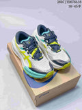 Pair of white ASICS trail running shoes with navy, lime, and turquoise details displayed on an ASICS shoebox; image text shows style code 2607JYD676A16 and size range 36–45.