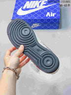 Close-up of the dark textured outsole and circular tread pattern.