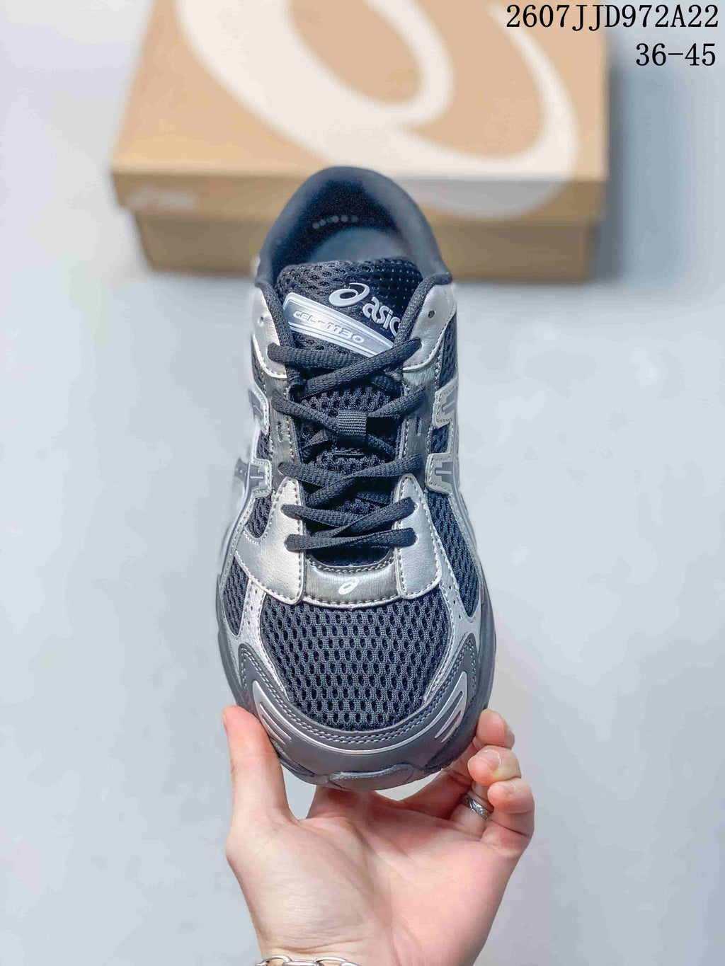 Top view showing the lace-up front, mesh-style toe panel, and Gel-1130 tongue branding.