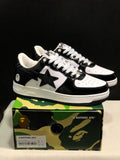 Black-and-white Bape Sta sneakers shown with a camouflage branded shoe box; the box label shows US 8, EUR 41 and CM 26.