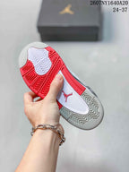 Bottom view showing the red, white, and gray textured rubber outsole with Jordan branding.