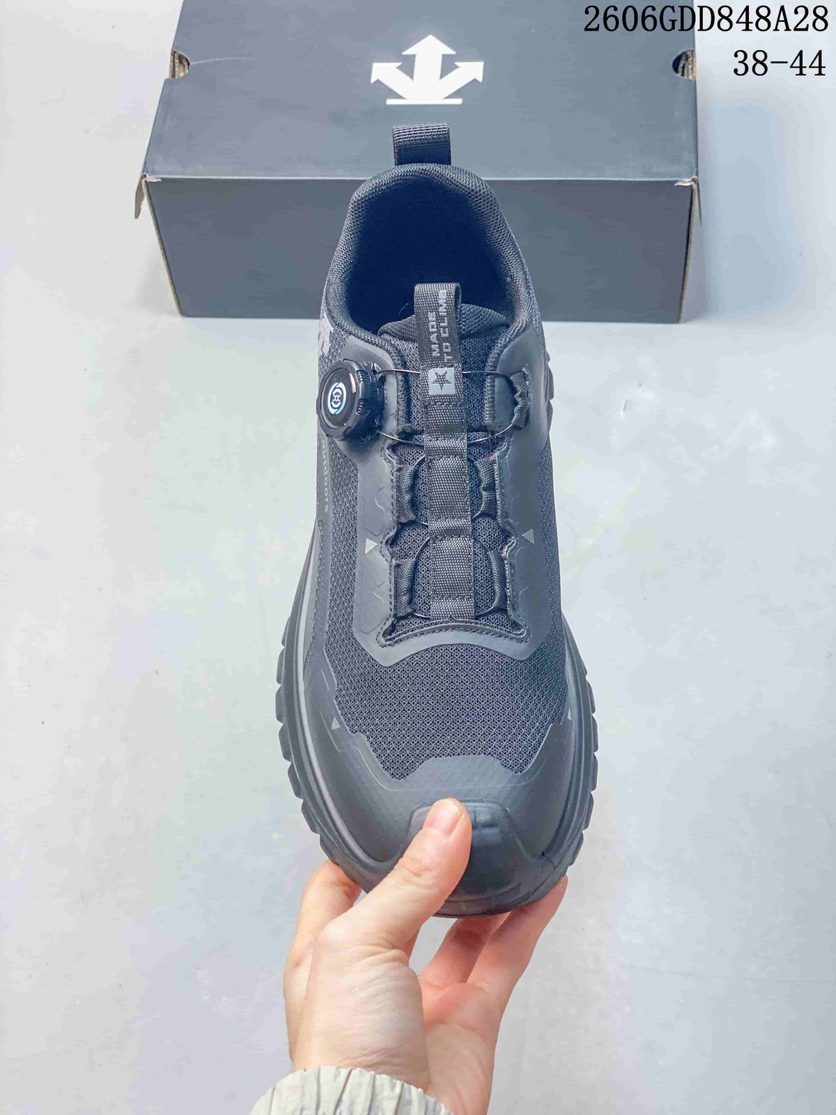 Top view showing the mesh-look upper and dial closure; image states sizes 38–44 and style code 2606GDD848A28.