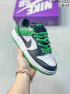 White, dark gray and green Nike SB Dunk Low Pro sneaker with bright green laces and outsole.