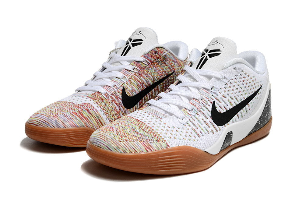 Pair of white and multicolor shoes with gum-colored outsoles.
