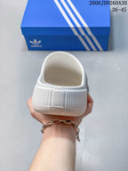 Rear view of the white mule clog with a molded heel and open back