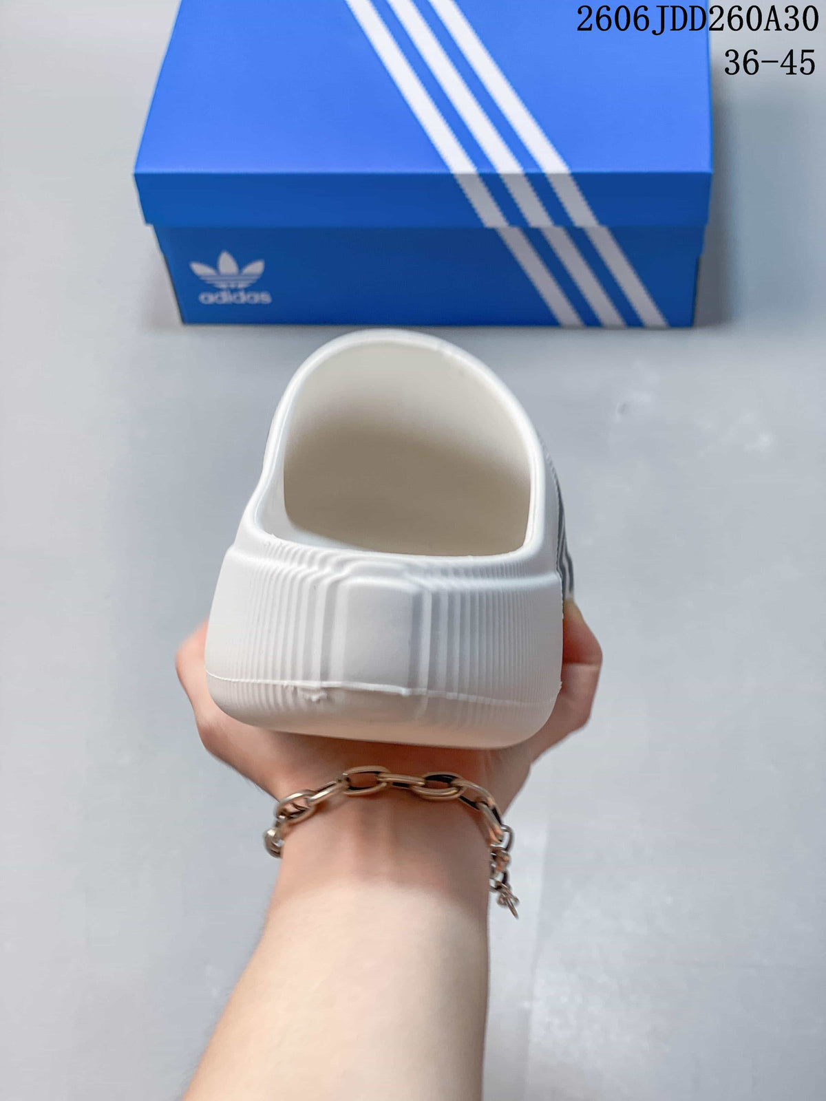 Rear view of the white mule clog with a molded heel and open back