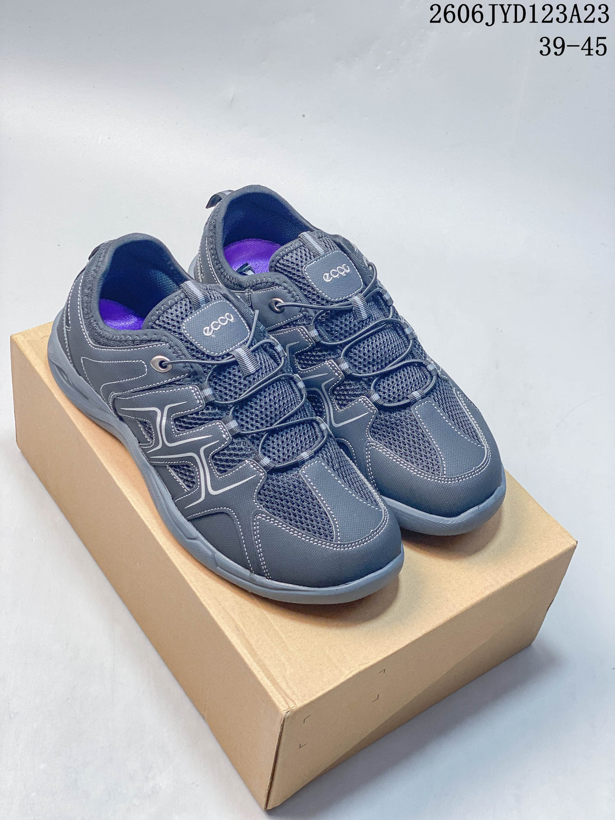 Pair of gray ECCO Sko low-top sneakers shown from above and at an angle.
