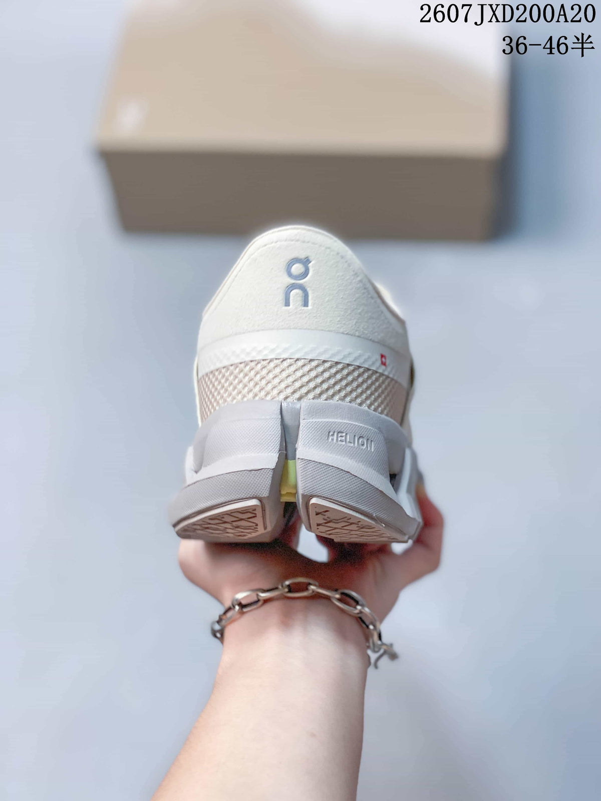 Rear view showing the padded heel area, On logo, and outsole structure.
