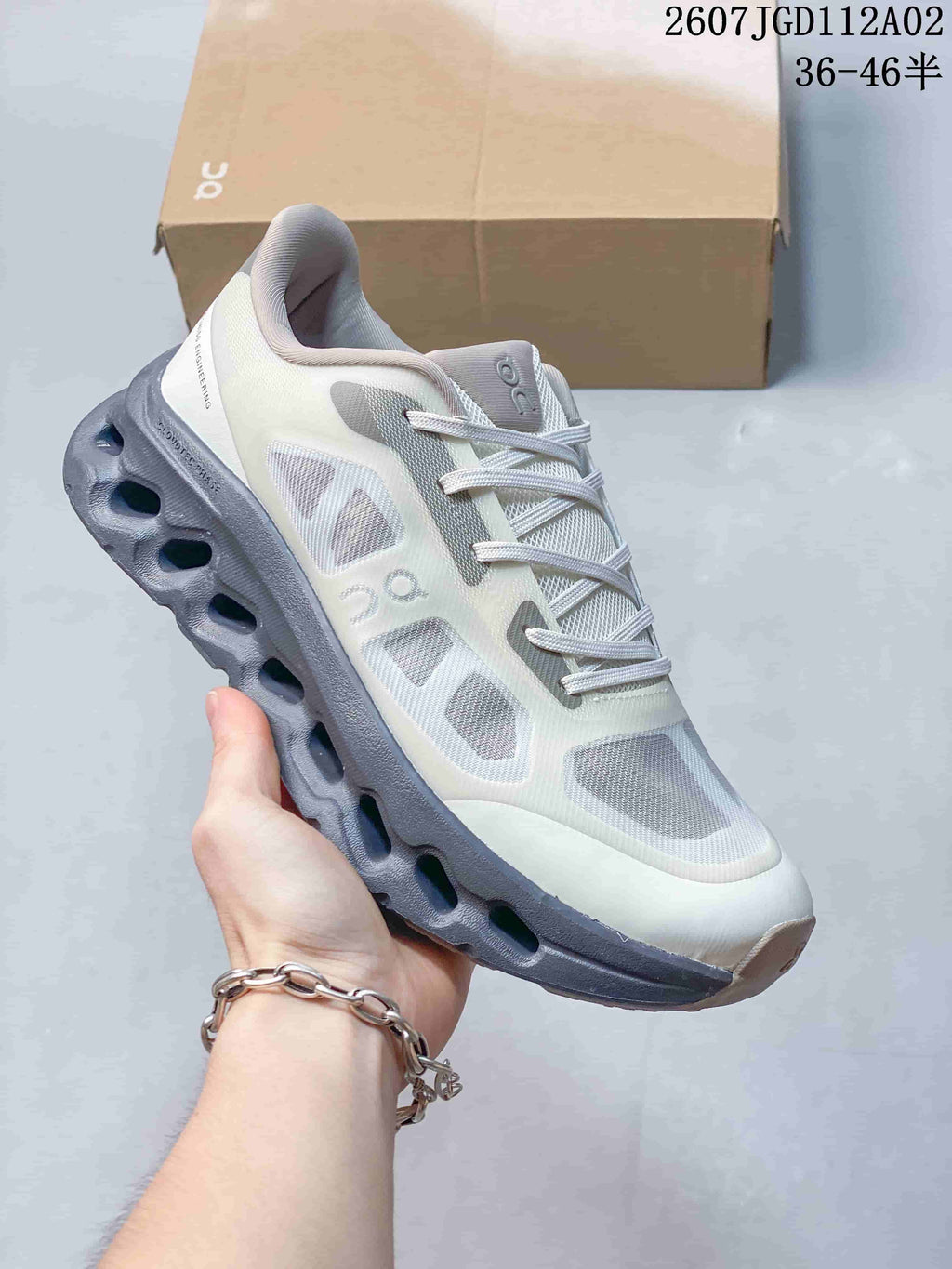 Angled side view of the sneaker with its sculpted gray sole