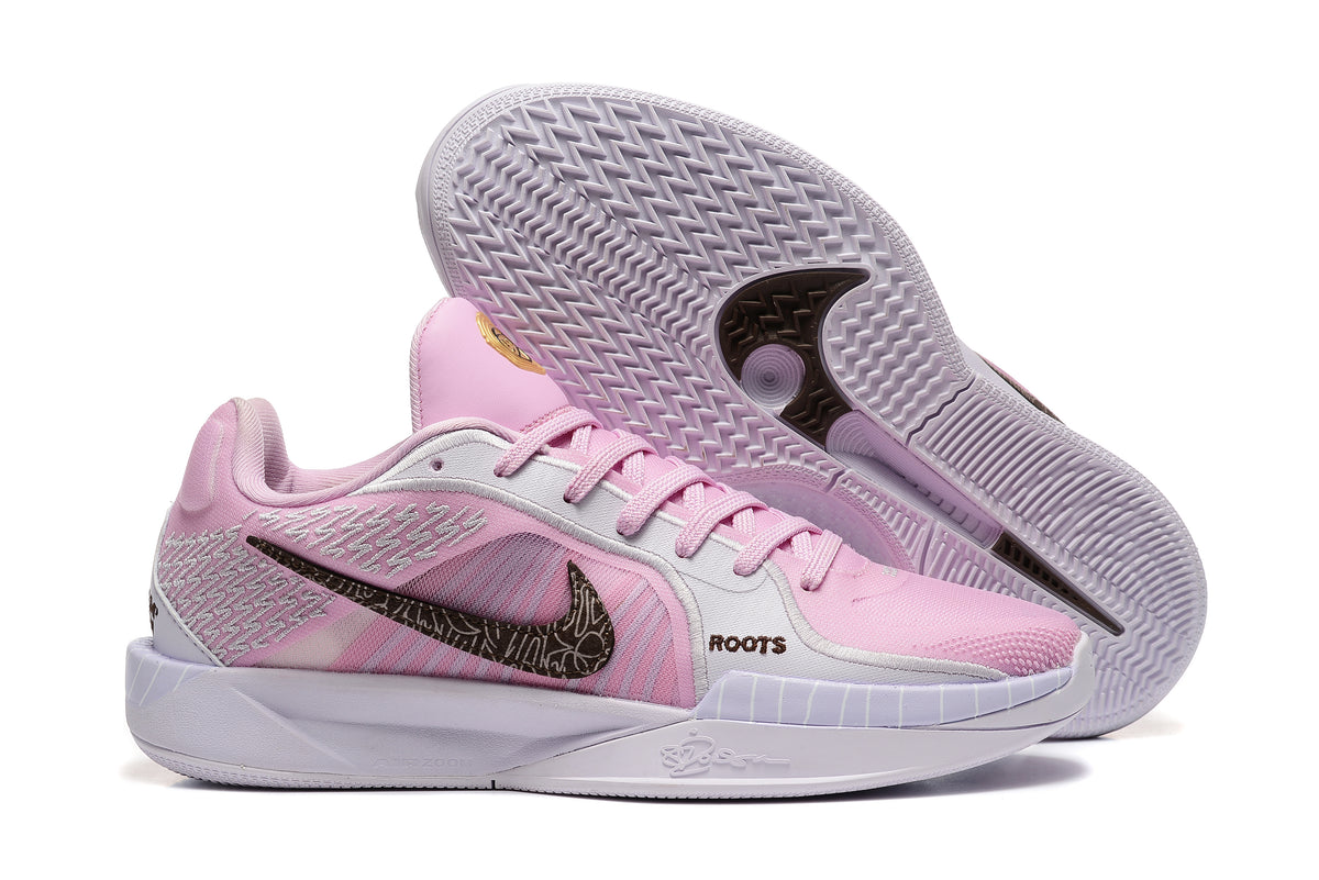 Basketball shoes displayed with the textured outsole visible.