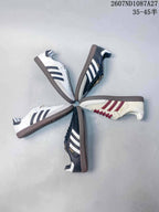 Four adidas Samba colorways arranged in a circular layout, including black, white, and cream combinations.