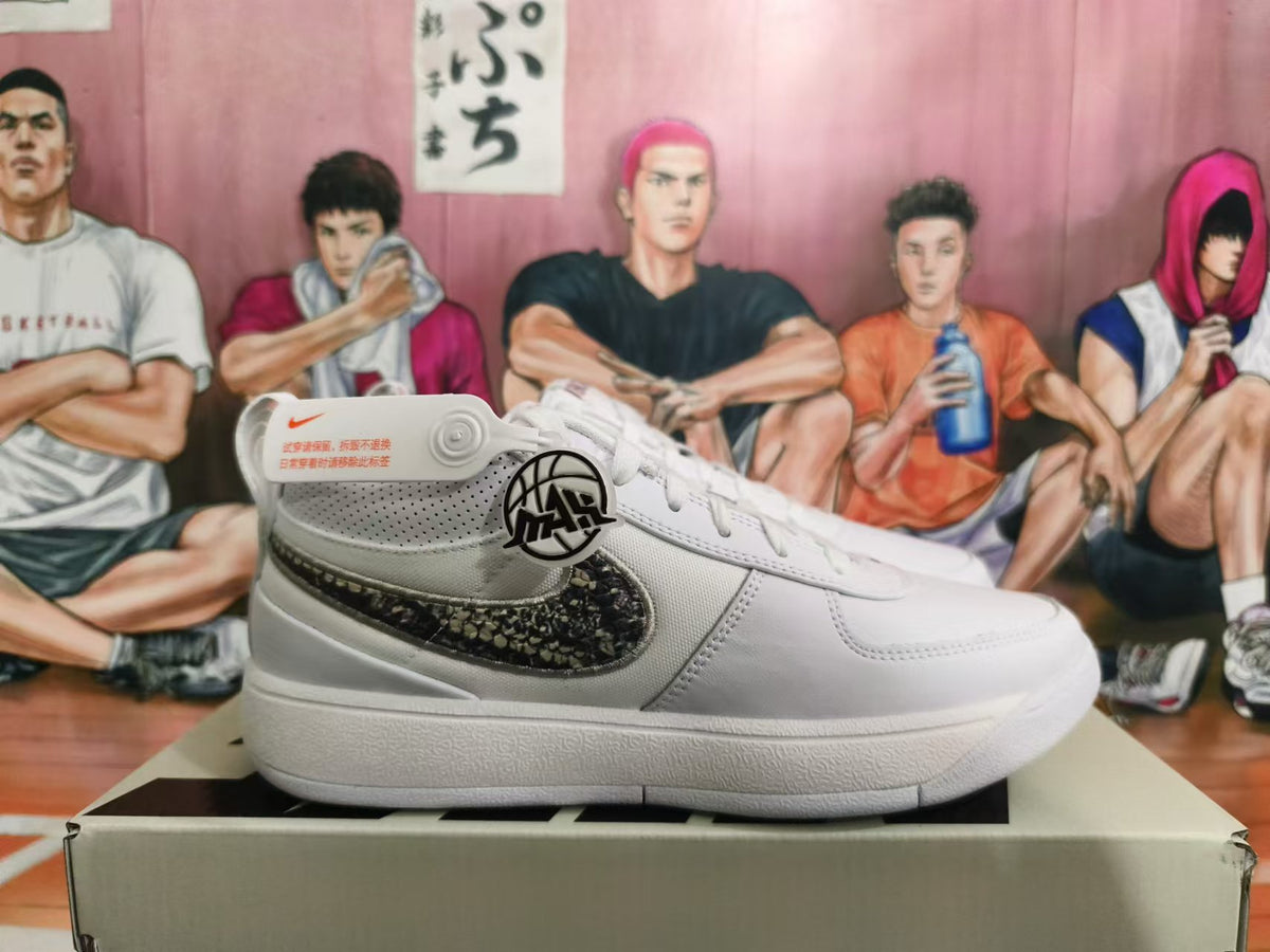 Side view of a white Nike sneaker with a dark patterned Swoosh and ankle strap detail