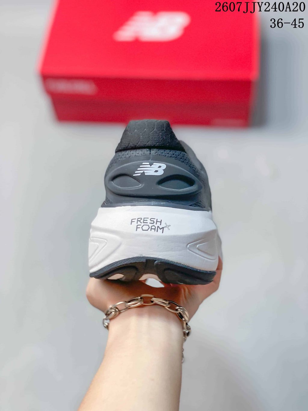 Rear view showing the New Balance heel logo and Fresh Foam X branding on the white midsole.