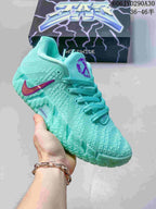 Aqua Nike Ja 3 basketball shoe with purple accents