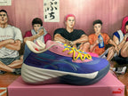 Side view of a blue and pink basketball shoe with cream and dark blue sole accents; ALL-PRO lettering is visible.
