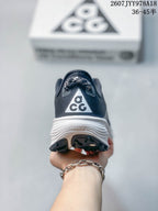 Rear view showing the ACG heel logo, padded collar, white midsole, and outsole tread.