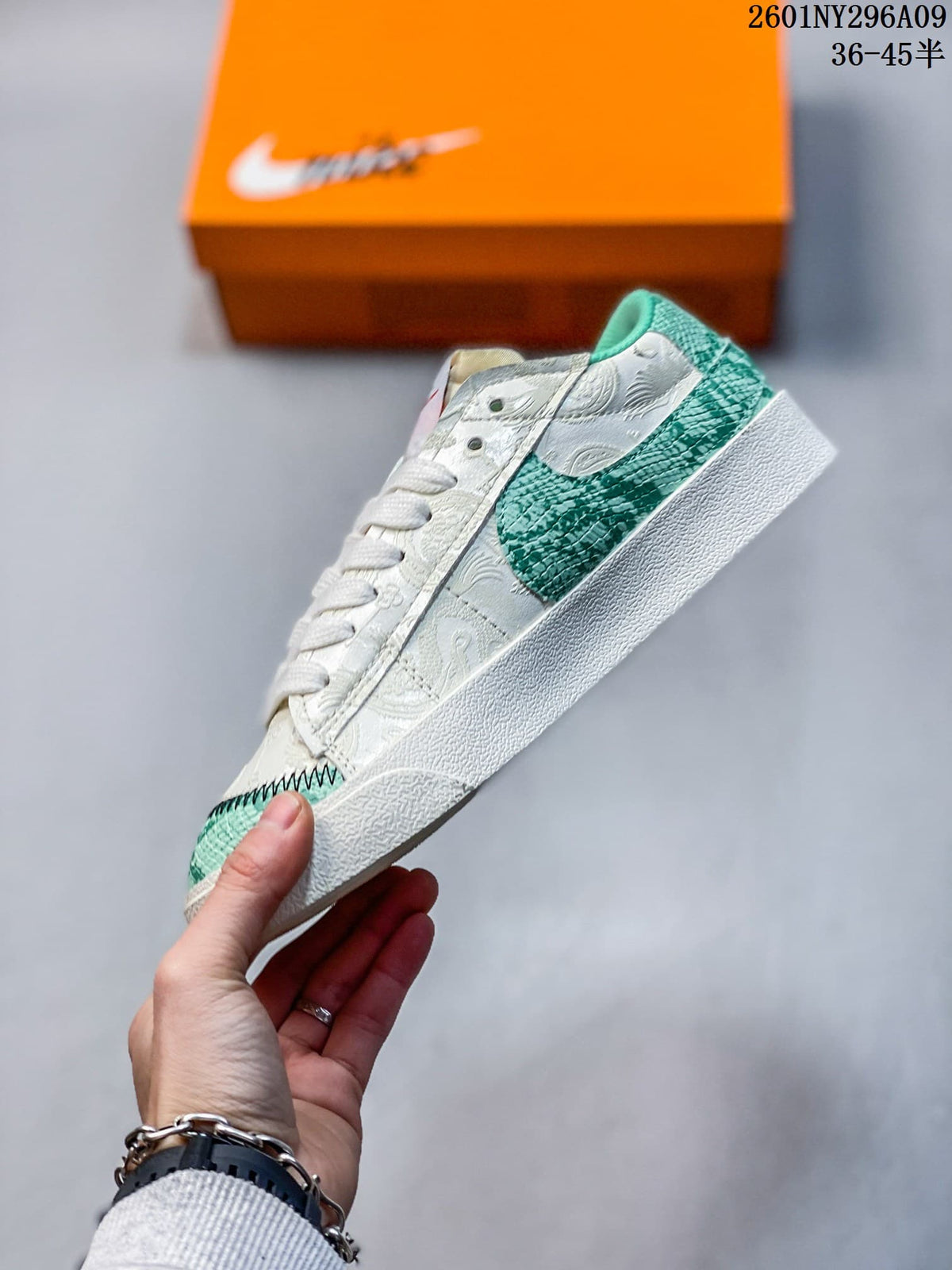 Side view highlighting the oversized green Swoosh and white textured upper.