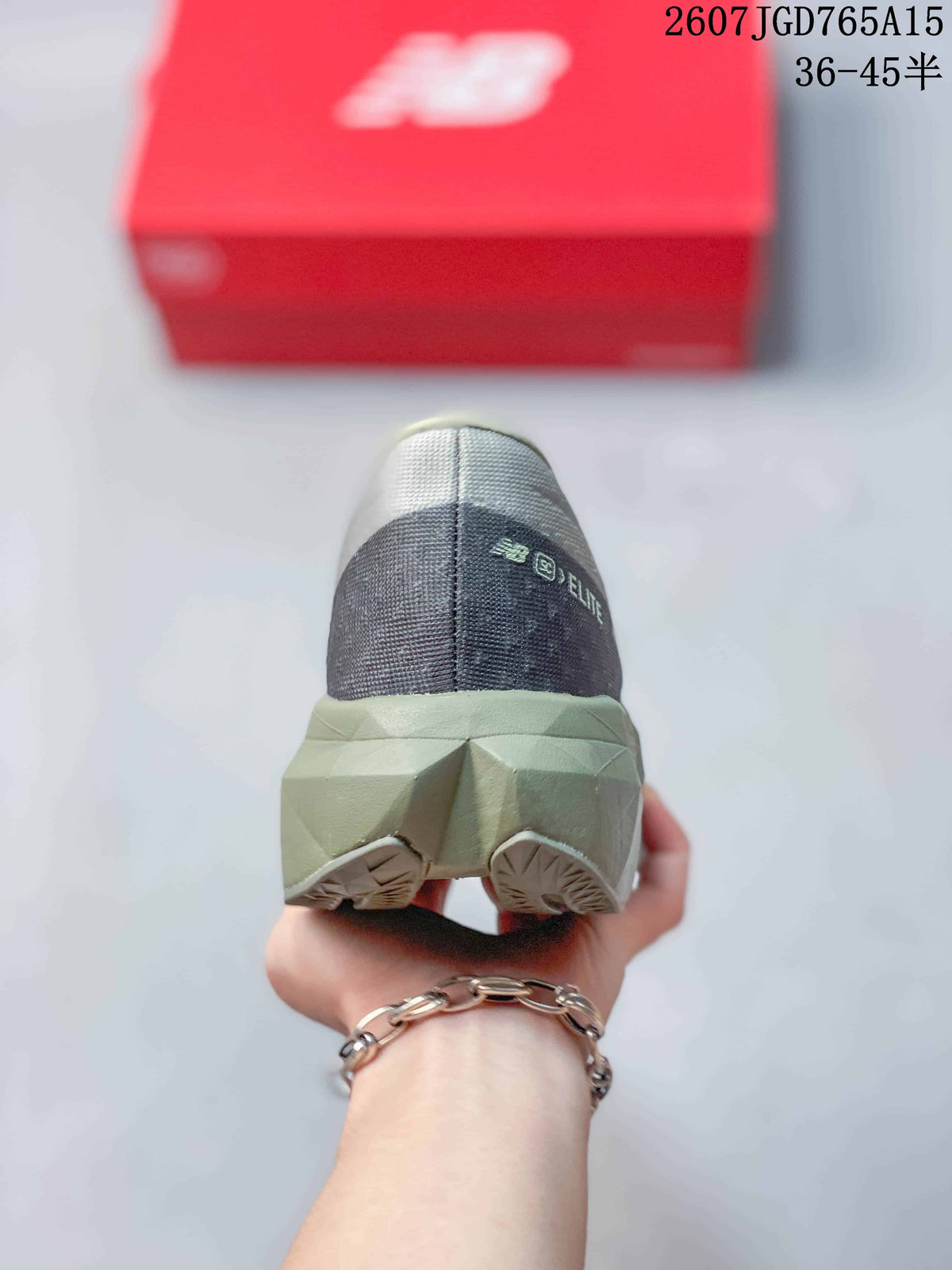 Rear view of the gray running shoe showing the padded heel, sculpted midsole, and outsole sections.