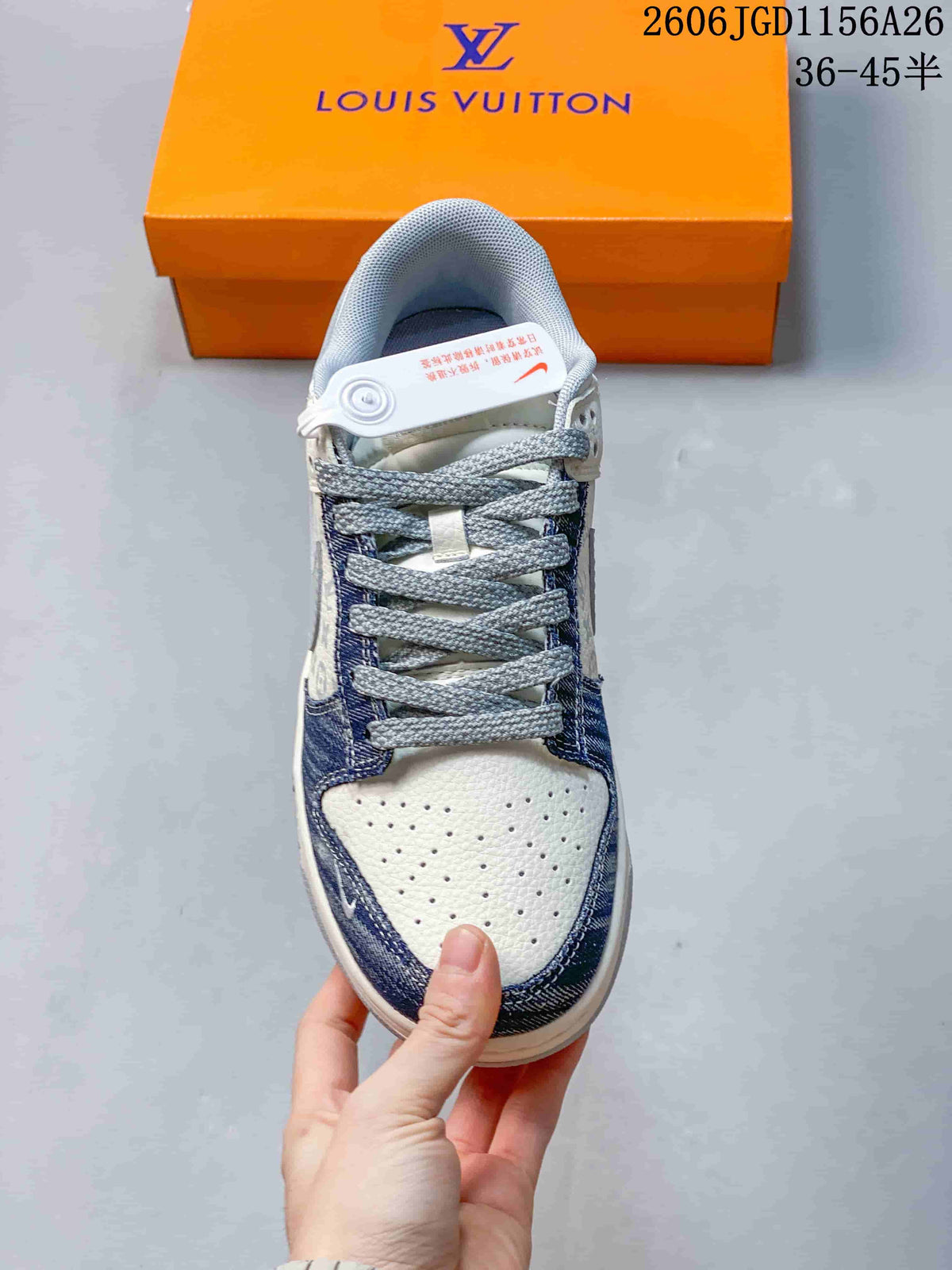 Top view showing the perforated toe, gray laces, and denim-blue trim