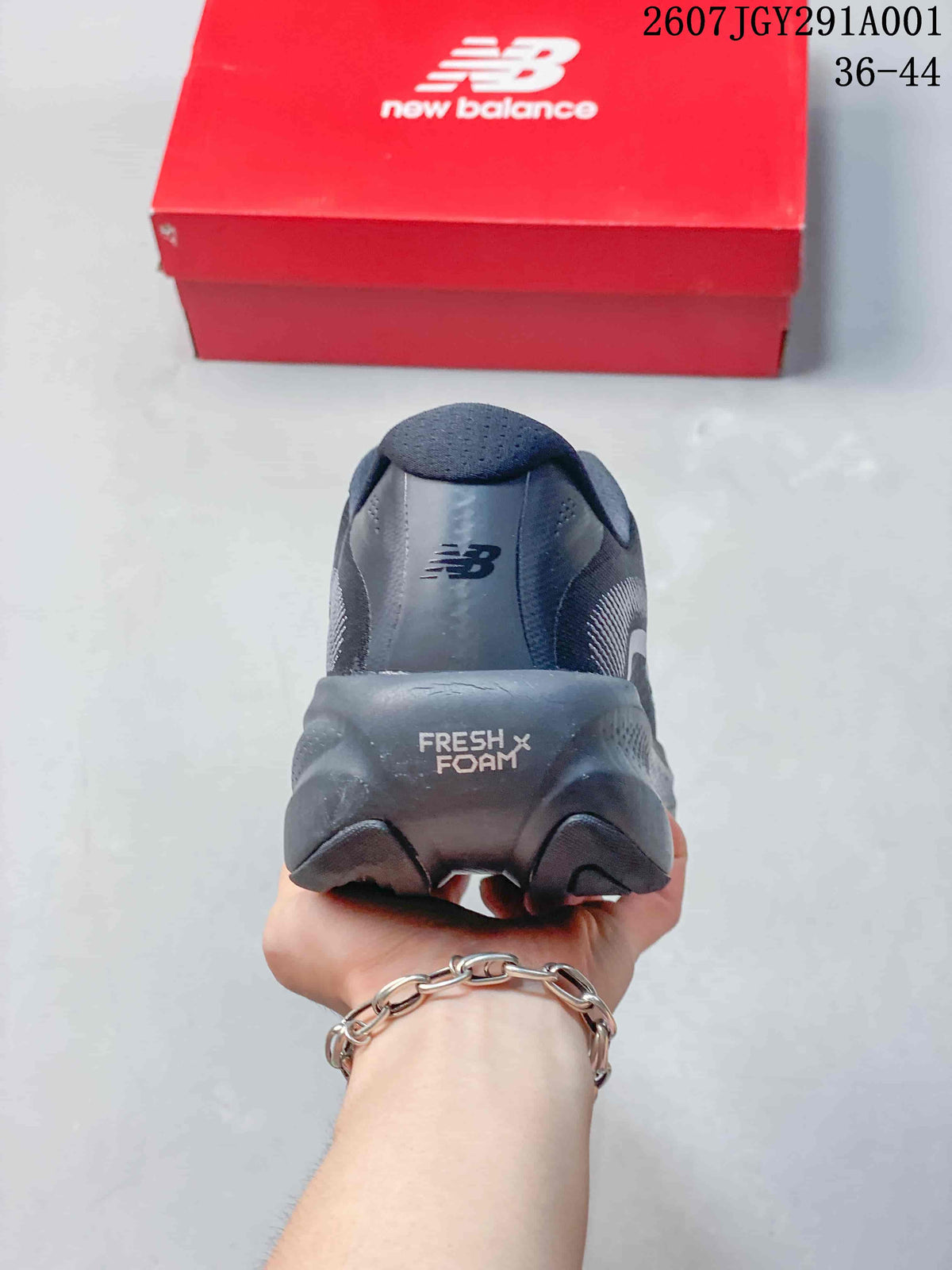 Rear view of the dark gray shoe showing the heel and sculpted sole.