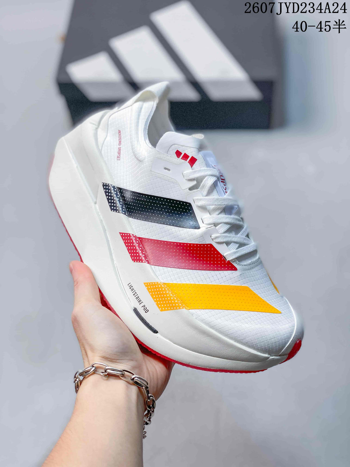 Three-quarter side view showing the white upper, colored side panels and Lightstrike Pro marking.