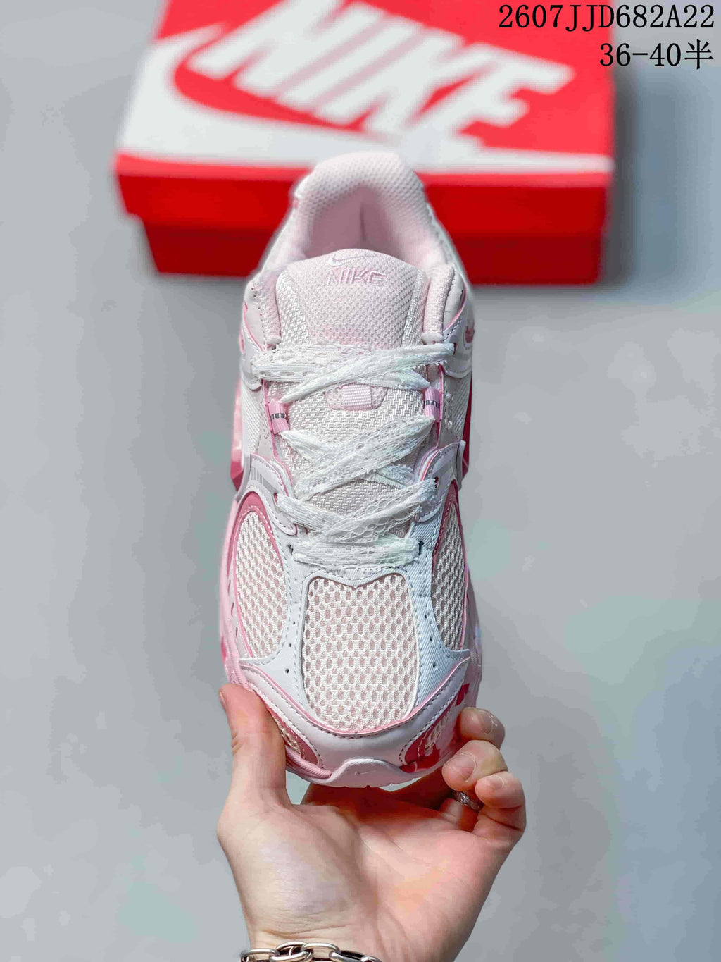 Top view showing the mesh toe box, padded tongue, and white laces.