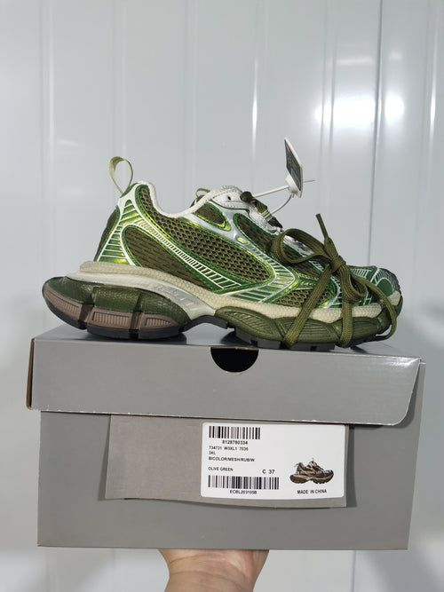 Olive green mesh sneaker displayed on its box, with the box label showing style code 7035, Olive Green, and a photographed size of C 37.