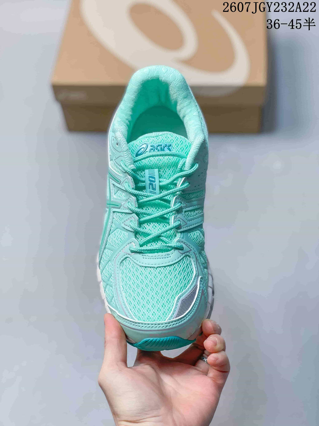 Top view showing the mesh toe box, laces, tongue, and ASICS branding.