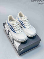 Pair of white Adidas sneakers with blue side accents and matching white laces.