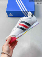 Side profile of the white adidas Samoa sneaker with black and red stripes and a multicolor outsole.