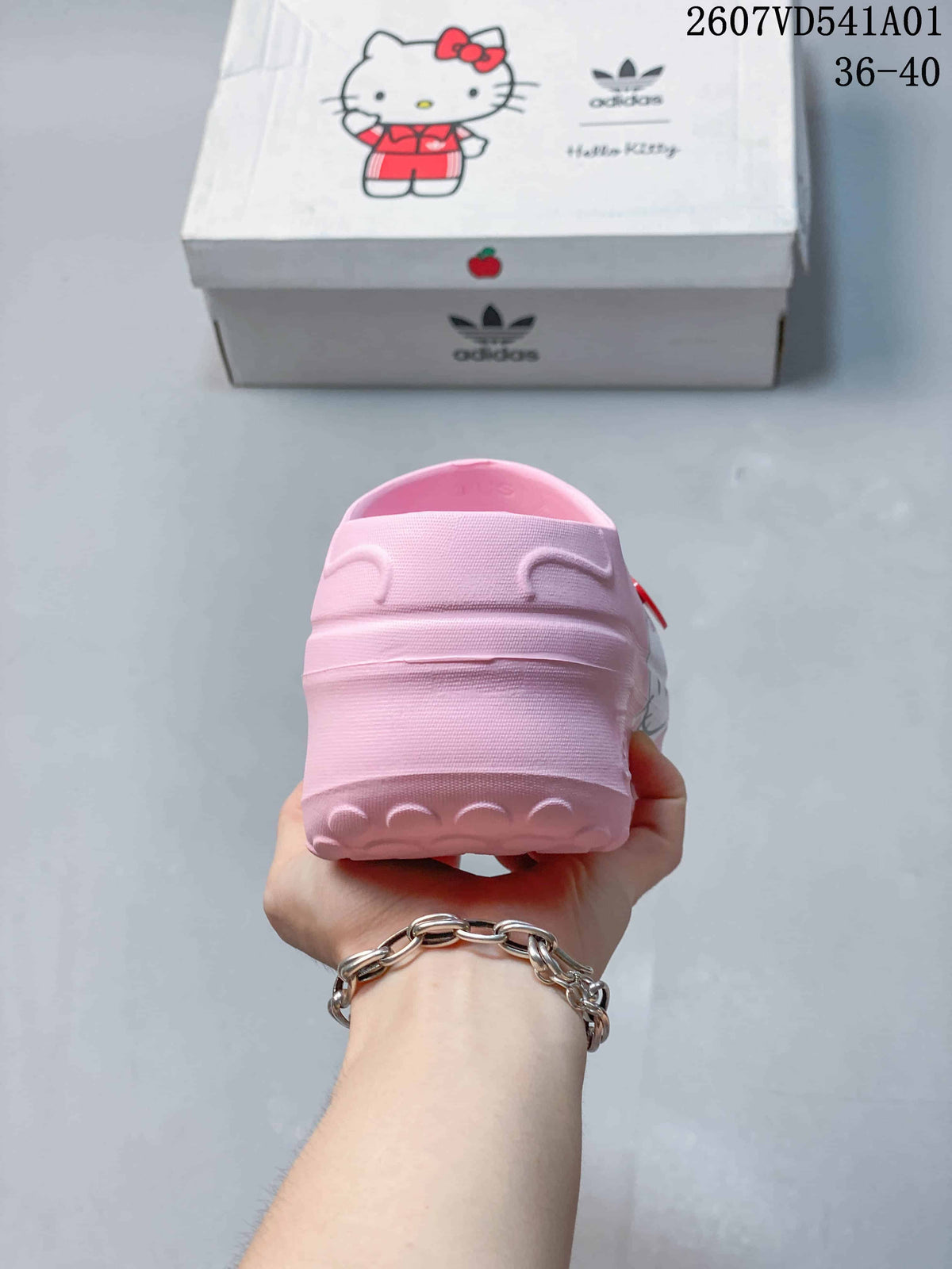 Rear view of the pink mule clog showing the heel and raised sole