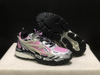 Pair shown with one shoe lifted to reveal the black textured outsole and segmented tread pattern.