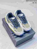 Pair of gray, navy, white and neon yellow Ozweego sneakers displayed on a shoebox; image text shows style code 2607GXD424A24 and size range 36–45.