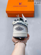 Rear view showing the Air Jordan winged basketball emblem and patterned heel panel.