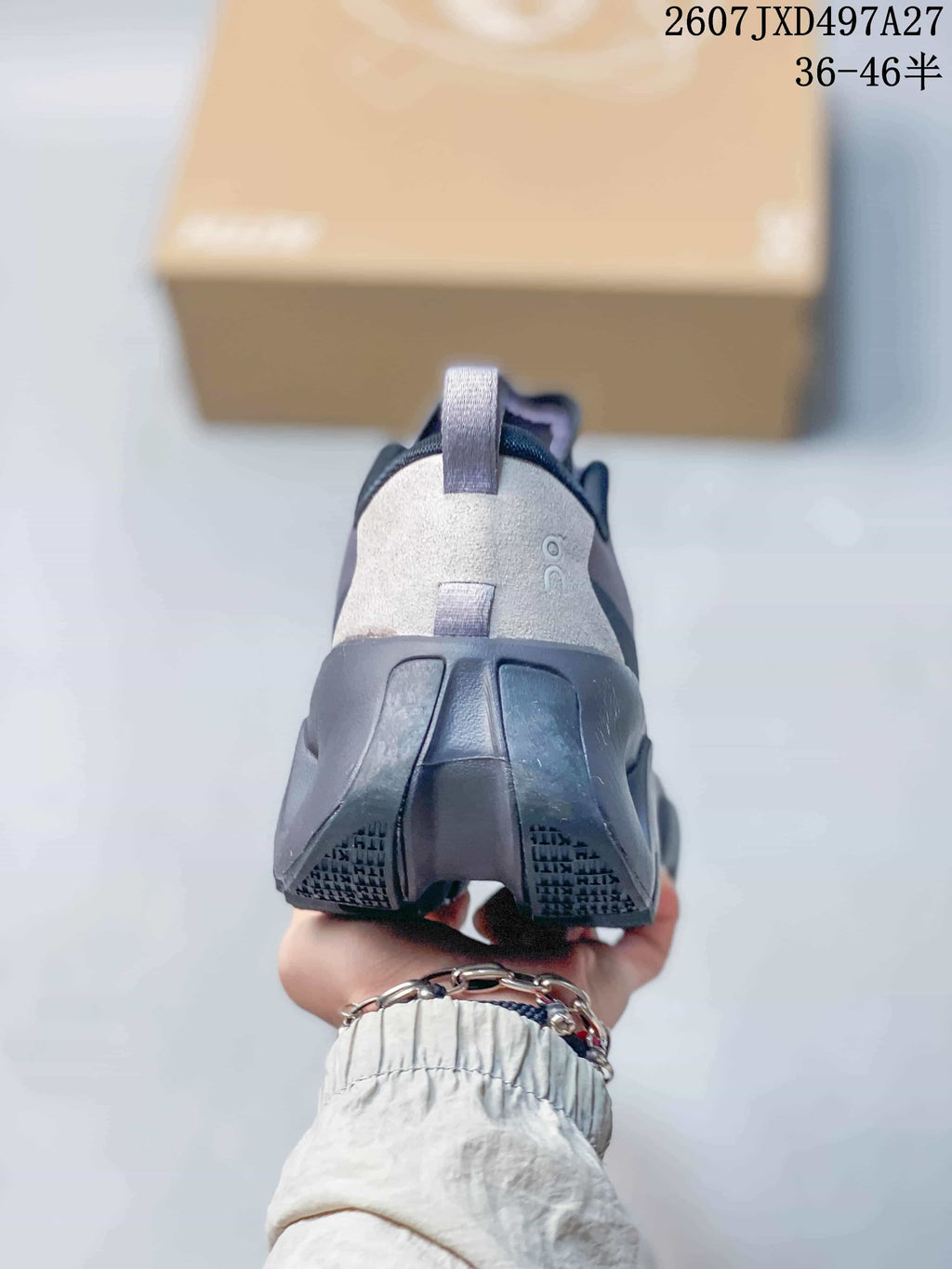 Rear view of the sneaker showing the padded heel, pull tab and sculpted outsole.